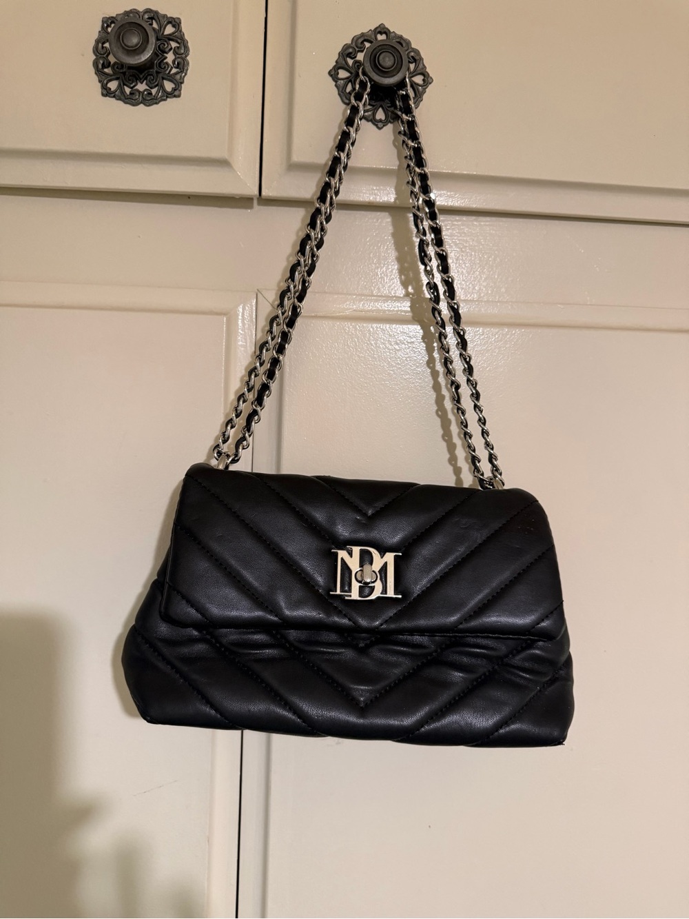 Black Quilted Shoulder Bag with Silver Chain and Monogram Accent